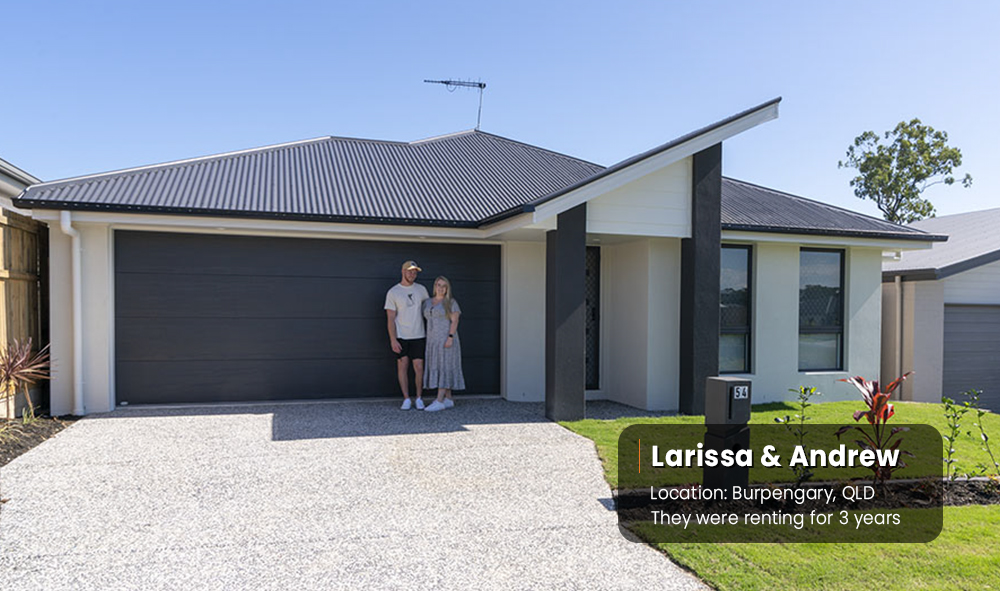 Couple-Stand-In-Front-New-House